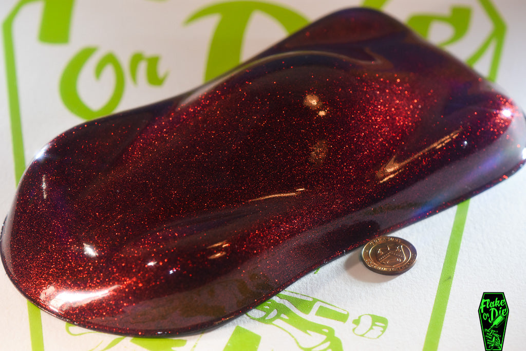 Flake Or Die red metal flake size .004" square cut, on black speed shape