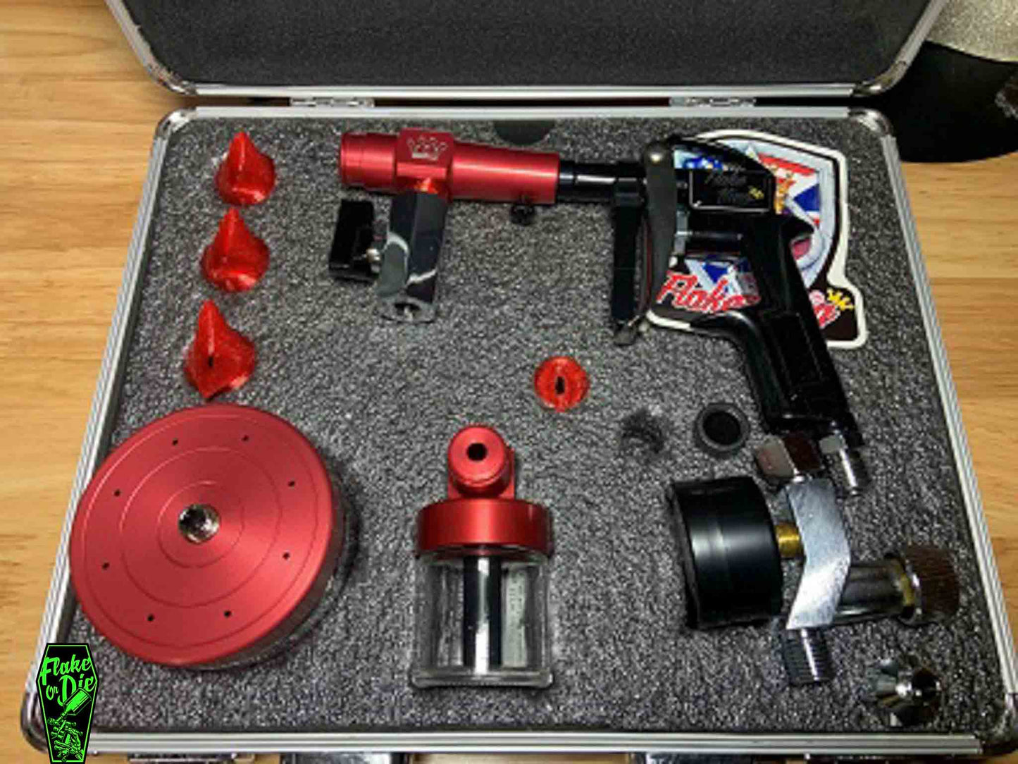 You get the Flake King 1000, the Flake King Mini Gun kit, and the adapter to use the Mini gun with your airbrush. It comes with 3 full size nozzles, and 1 for the mini gun, an adapter to fit the end of the mini gun to an Iwata Eclipse, and an air valve.