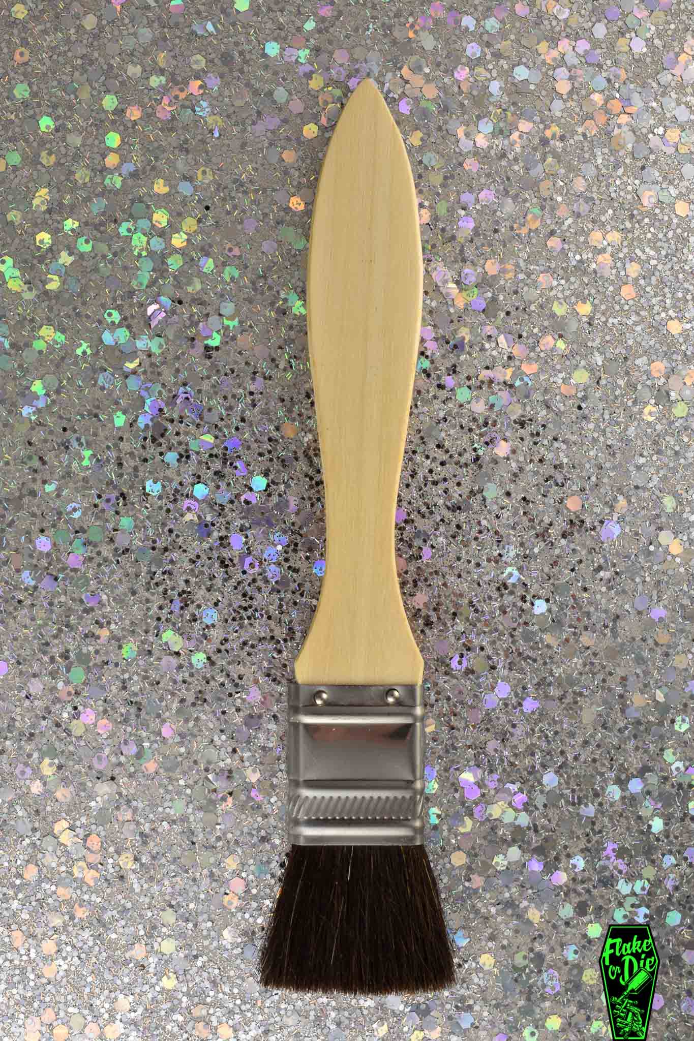 Synthetic hair flat gilder's mop to apply gilding varnish or sizing.