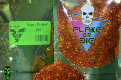 Flake Or Die Atomic Pumpkin: orange holographic metal flake particles. In the package