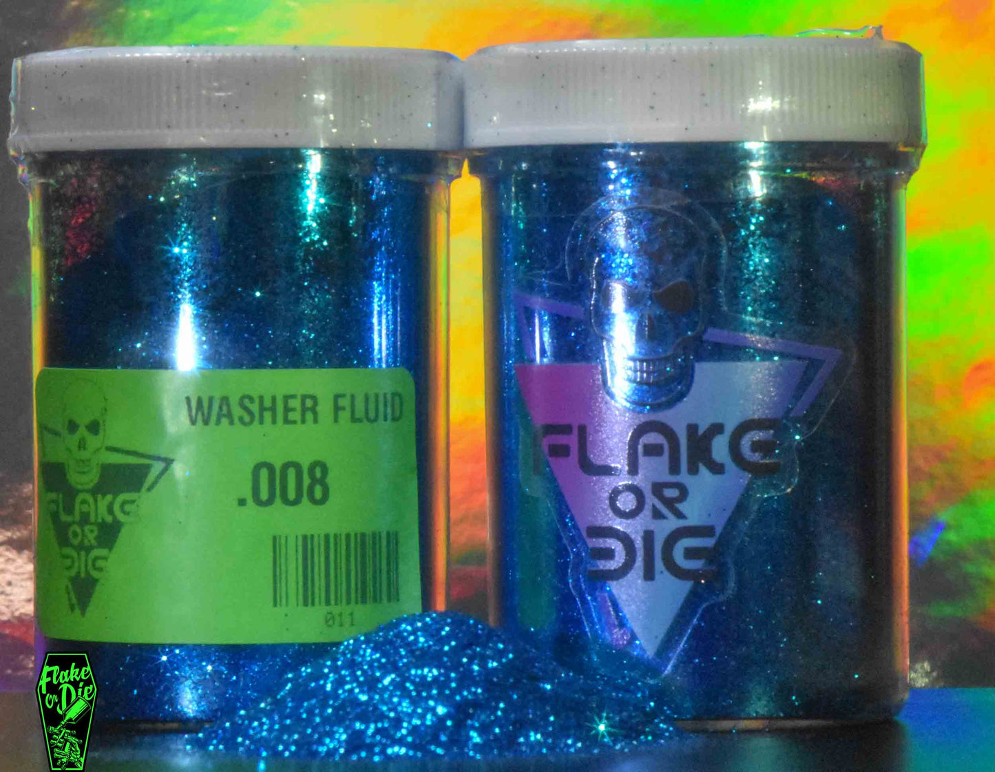 Product shot of Flake or Die blue metal flake, Washer Fluid .008" hex cut in product packaging. Clear plastic jar with Logo. Small pile of loose metal flake in front of packaging.